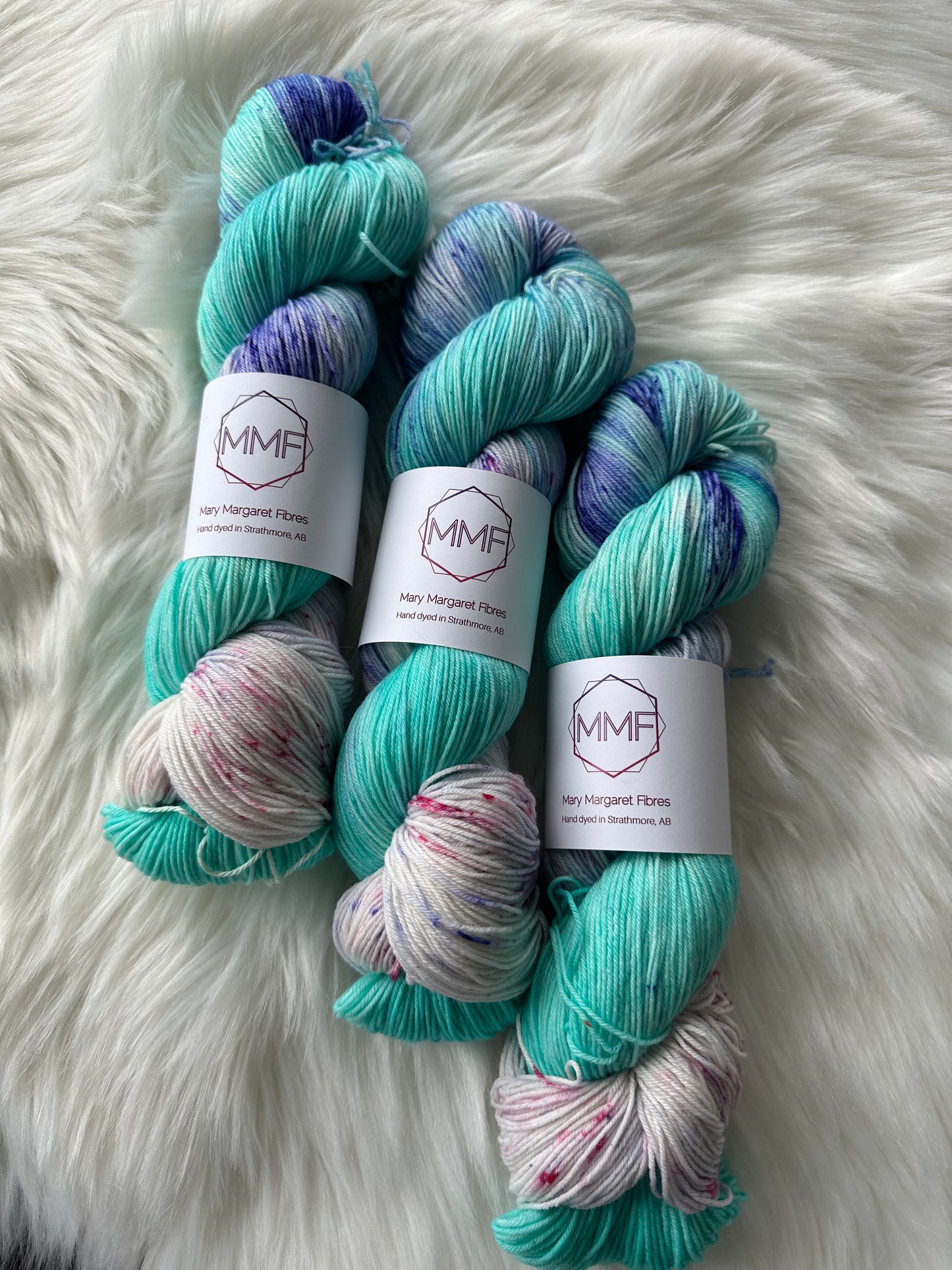 MMF Violet Crowned Wood nymph on Fingering Skein