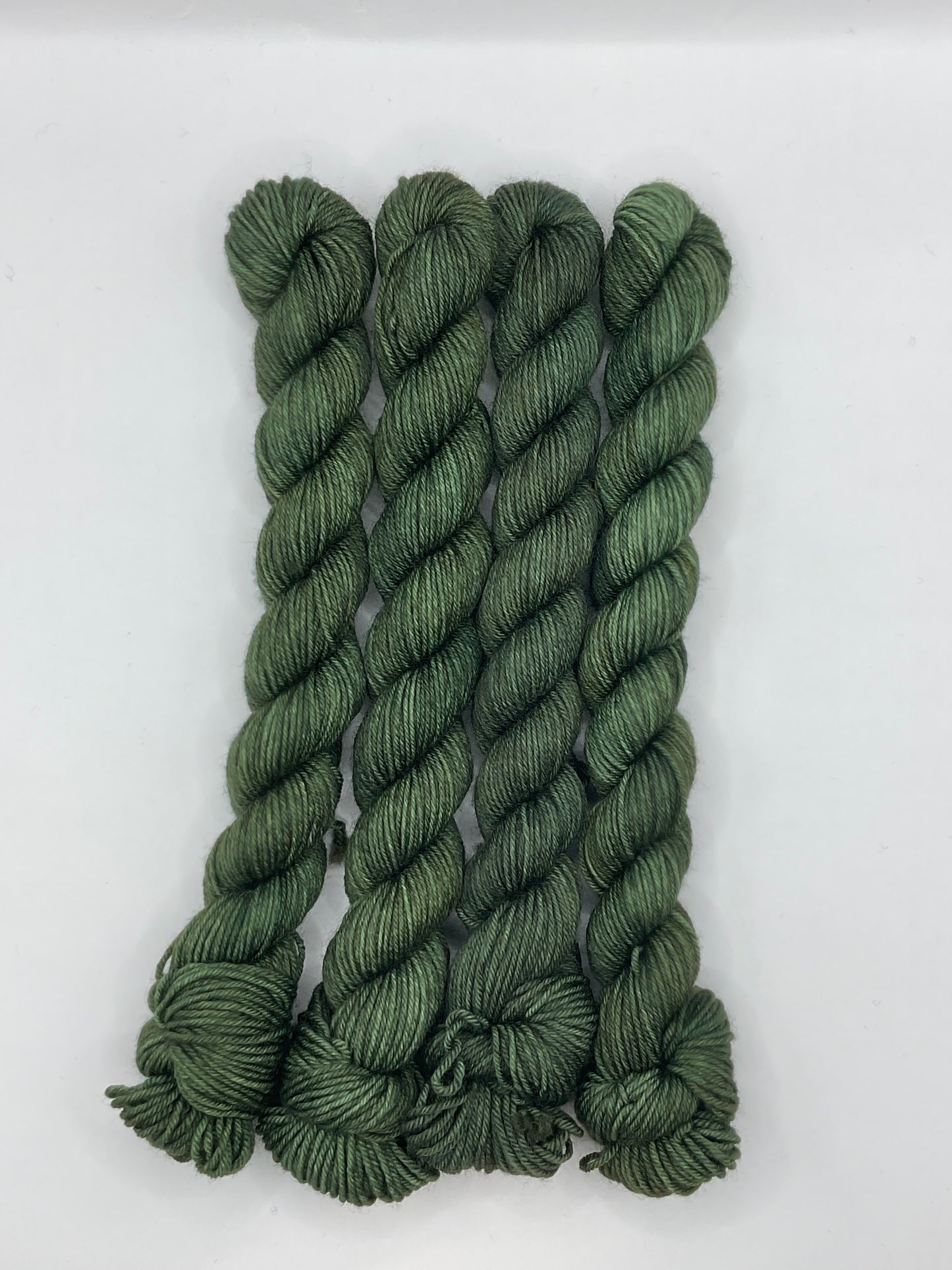 Mini Hunter Green Fingering skein