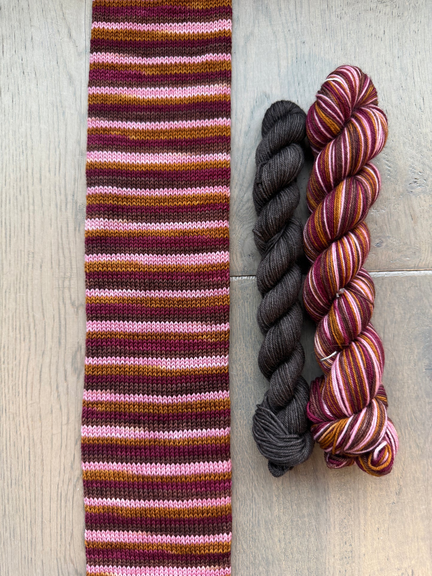 Grandma Got Run Over by a Reindeer Fingering Self-Striping Sock Set